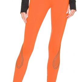 adidas by Stella McCartney Truepace Tight C.R in Tangerine. Size M, S, XS.